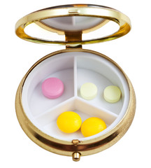 compact pill box with few tablets