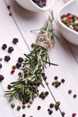 Fototapeta premium Rosemary bound on a wooden board