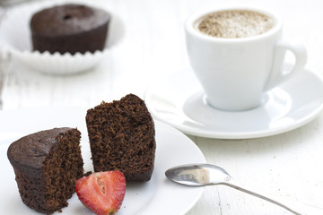 Сhocolate cake and cup of coffee