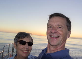 Couple selfie on sunset cruise Kauai