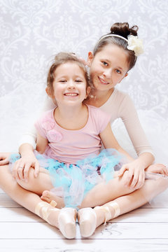 Cute sisters during ballet rehearsal