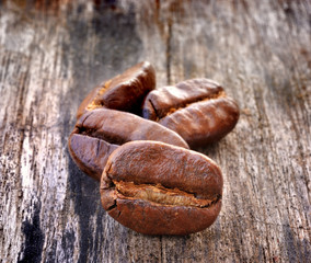 Obraz premium Coffee on grunge wooden background