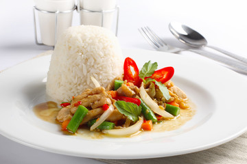 Thai spicy food, stir fried chicken whit basil on rice.