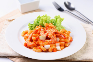 Macaroni fried with shrimps and Tomato sauce