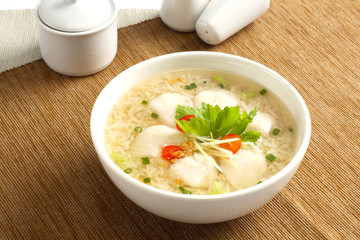 Boiled rice fish in a bowl