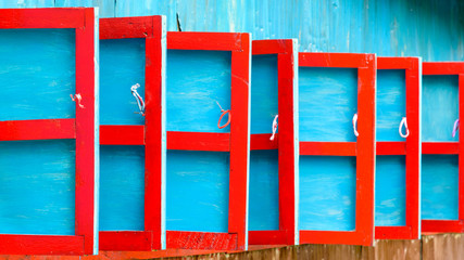 Red and blue wooden shutters