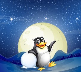 A penguin beside the snowball