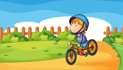 A young boy biking outdoor