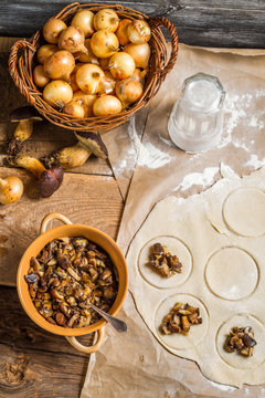 Closeup of Cooking homemade dumplings with mushrooms