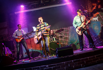 Band performs on stage
