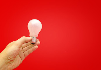 Background with lit lightbulb