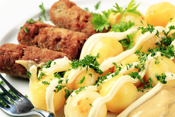 Cevapcici with potatoes