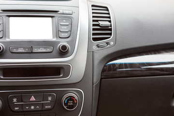 Obraz na płótnie Canvas Dashboard of modern car with white screen multimedia system