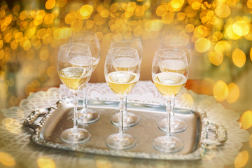 Flutes of champagne in holiday setting,Closeup.