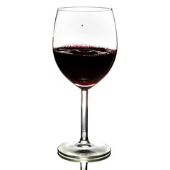 pouring red wine isolated