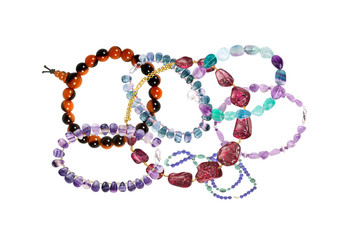 Beautiful bracelets with precious stones isolated on white