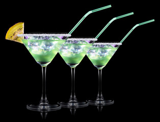 Cocktail Smoothie, with slices of kiwi on a black