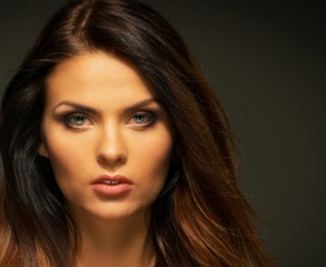 Fototapeta premium Seductive brunette woman with long hair