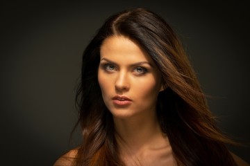 Naklejka premium Seductive brunette woman with long hair