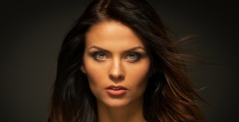 Fototapeta premium Seductive brunette woman with long hair