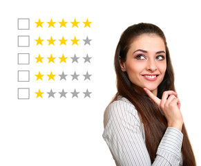 Thinking woman voting in stars rating. Isolated