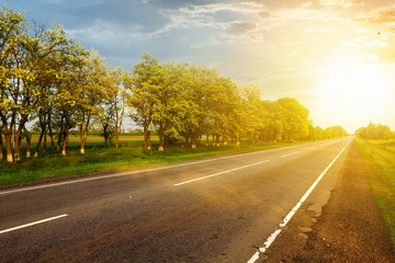 asphalt road at the sunset