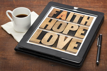faith, hope and love on digital tablet