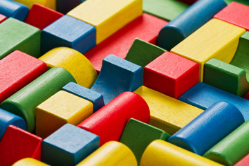 Toys blocks, multicolor wooden colorful bricks background