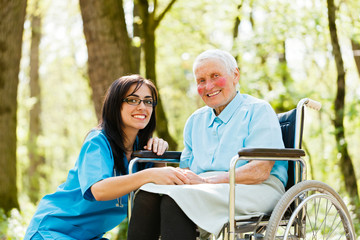 Fototapeta premium Smiling Doctor with Kind Woman
