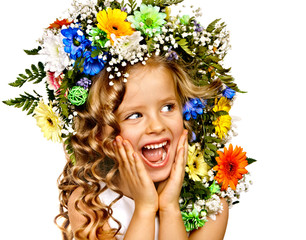 Child with flower hairstyle.