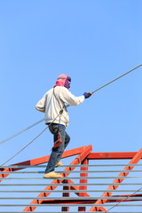 labor working in construction site for roof prepare