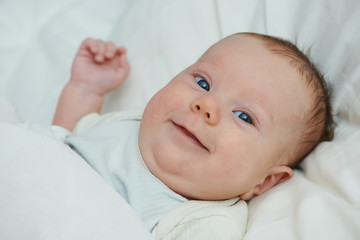smiling newborn baby
