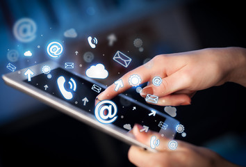 Hand touching tablet pc, social media concept