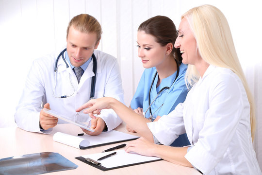 Medical Team During Meeting In Office