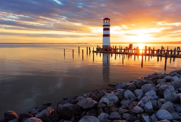 Foto auf Acrylglas Ocean sunset with lighthouse © TTstudio