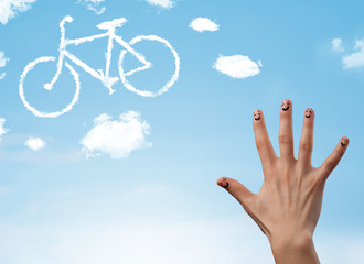 Happy smiley fingers looking at a bicycle shapeed cloud