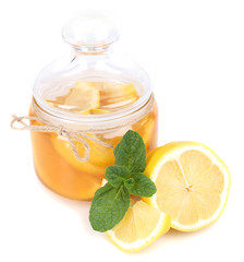 Tasty lemon jam isolated on white