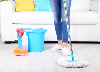 Cleaning floor in room close-up