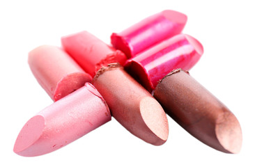 Several different lipsticks isolated on white