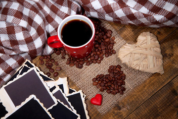 Composition with coffee cup, decorative hearts, plaid spices