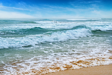 Fototapeta na wymiar seascape, sand beach and blue sky