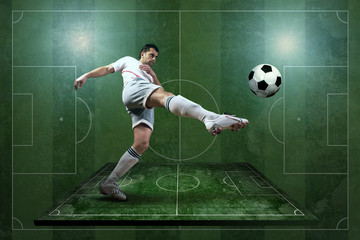 Player in action at the grunge football field.