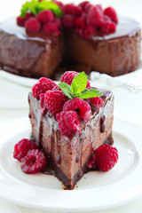 Chocolate cheesecake with raspberries.