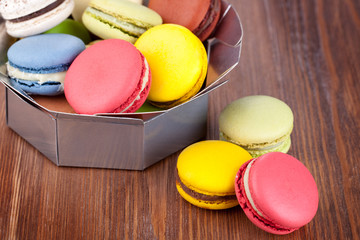 Macaroons on a wooden table