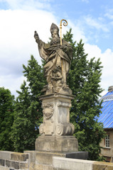 Fototapeta na wymiar Statue of St. Augustine. Charles Bridge in Prague.