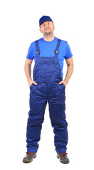 Fototapeta premium Worker with arms in pockets.