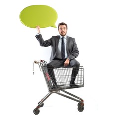 Message of a businessman with shopping cart