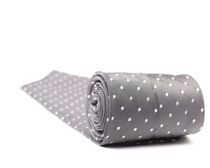 Folded gray tie with white speck.