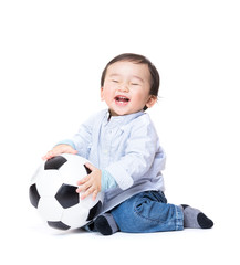 Asiab baby boy feel excited playing soccer ball