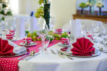Elegant table set  for wedding or event party in pink with dots.